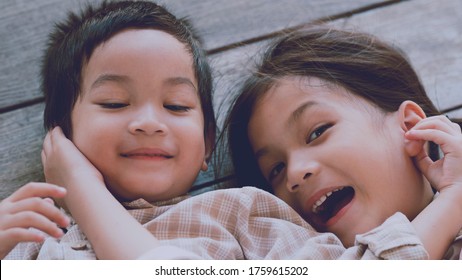 A Family Bonding.Asian Sibling  Little Boy And Girl Spent Their Time Together.Interpersonal Relationship Quality In Young Adulthood.Love And Care,family Support.Concept Of The Role Of Sibling Support.