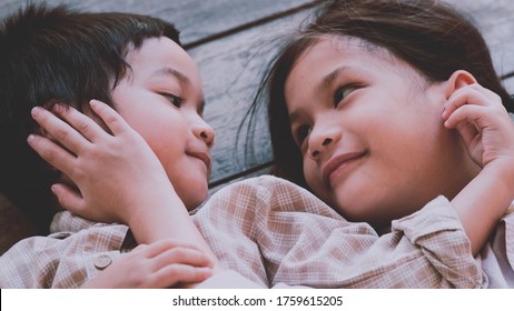 A Family Bonding.Asian Sibling  Little Boy And Girl Spent Their Time Together.Interpersonal Relationship Quality In Young Adulthood.Love And Care,family Support.Concept Of The Role Of Sibling Support.