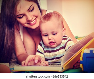 Family Book Read With Mother And Baby Sitting Floor. Early Reading Develops Children. Sepia Color Tone Image.