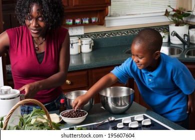 Family: Boy Reaches For Chocolate Chips