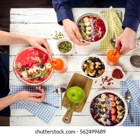 Family Breakfast With Berries Smoothies And Superfoods. Healthy Eating Concept. Top View