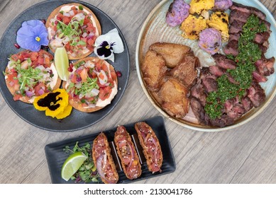 Family Buffet Meal With Ribeye Steak, Ceviche Tacos, Or Crispy Ahi Poke Tacos To Choose From.