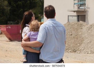 Family Building A House - Real Estate