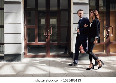 Family Business, Young Couple Starts Business, Full Length Side View Photo.man And Woman Rushing To The Aim