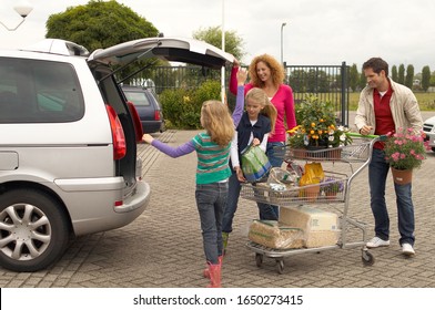 Family Buying Gardening Supplies Together