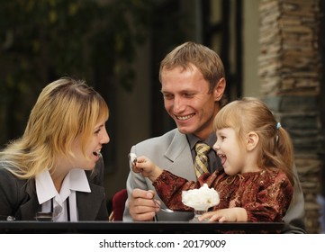 Family In Cafe