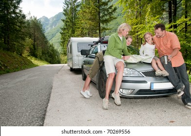  Family With Camping Car On The Road