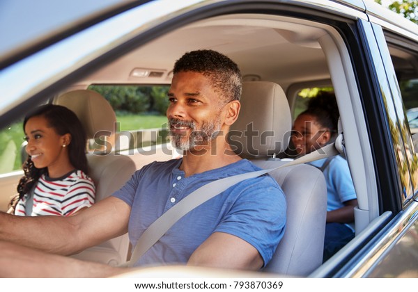 Family In Car Going On Road\
Trip