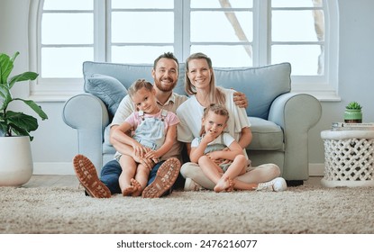 Family, care and parents with kids in portrait, happiness and together on home living room floor. People, bonding or smile with love, mother and father relax with children in dream home lounge - Powered by Shutterstock