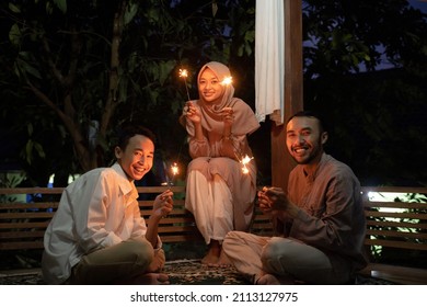 The Family Celebrates Eid Mubarak At Night By Burning Fireworks