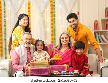 Family celebrating diwali with lots of gift - Powered by Shutterstock