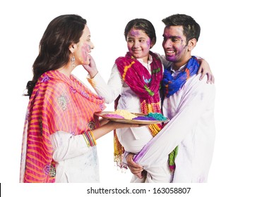 Family Celebrating Holi Festival