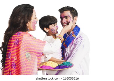 Family Celebrating Holi Festival