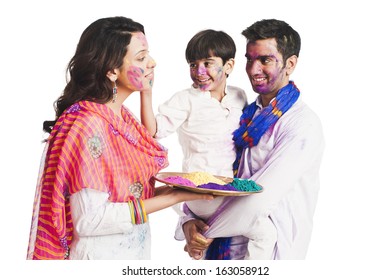 Family Celebrating Holi Festival