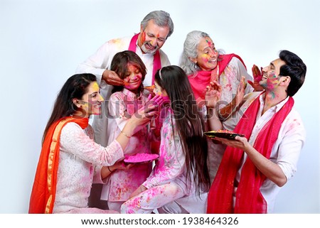 Family celebrating holi in india with full of happiness