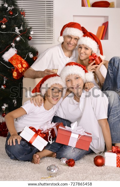 Family Celebrating New Year Stock Photo (Edit Now) 727865458