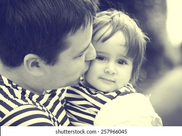 Family With Child And Father  In Same Stripes Clothes Vintage Black And White Nature