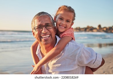 Family, child and grandpa on beach vacation with smile, love and fun senior man carrying girl on back on tropical summer trip. Active grandparent and happy kid laughing during piggy back ride by sea