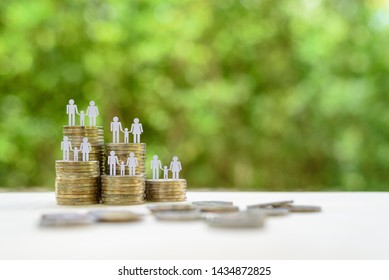 Family Or Child Trust Fund / Fundraising Concept : Family Members One Baby Or Kid On Row Of Coins, Depict Grantor Establishes A Trust Fund To Provide Financial Security To An Individual E.g Grandchild