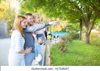 Family With Child In Zoo