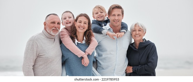 Family, Children And Beach With Parents, Grandparents And Kids Outdoor Together While On Holiday Or Vacation. Travel, Love And Bonding With A Senior Man, Woman And Grandkids Spending Time On A Coast