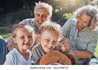 Family, Children And Love With A Girl, Grandparents And Sister Outdoor In A Nature Park For Fun And Adventure. Kids, Park And Picnic With An Elderly Male, Female And Grandchildren Laughing Outside