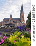 Family with children and pet dog, kids and adults visiting nortern cities in Sweden, Uppsala