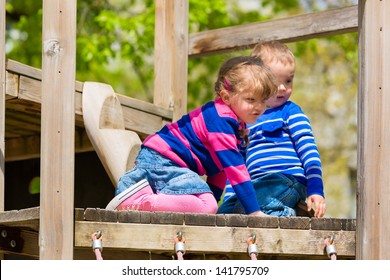 Family - Children Playing On A Jungle Gym