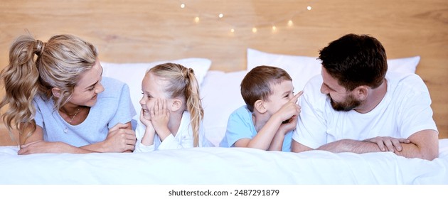 Family, children and relax in bed of home, sleep and weekend rest in bedroom. Smile, parents and siblings for bonding with mom and dad people, couple and love for comfort and happy together in house - Powered by Shutterstock