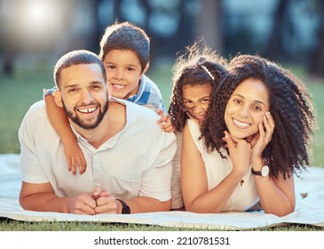 Family, Children And Smile On Grass For Portrait On Blanket To Relax Show Love, Care And Happiness. Black Mom, Dad And Kids On Picnic In Park, Garden Or Backyard Smile Together In Sunshine In Toronto