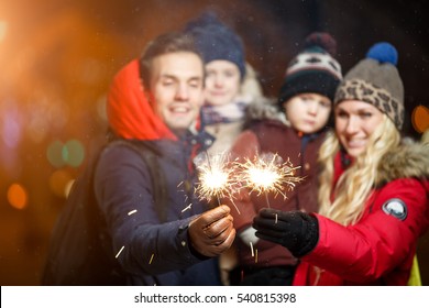 Family With Children With Sparklers