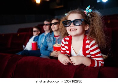 Family at the cinema - Powered by Shutterstock