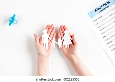 family concept with figures on desk top view mock up - Shutterstock ID 602125355