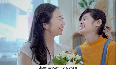 Family Concept, Mother And Daughter Are Showing Love Each Other By Hugging. South East Asian Families