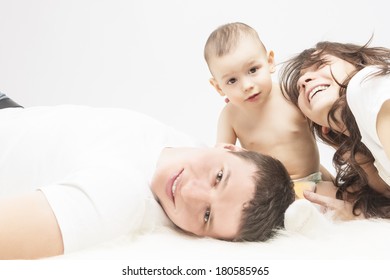 Family Concept: Family of Three People Together Smiling and Having a Good Time. Horizontal Image