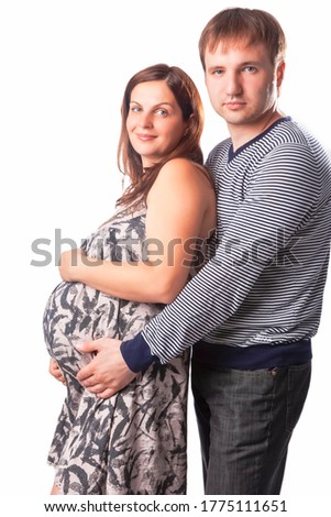 Similar – Pregnant woman embraced by her husband