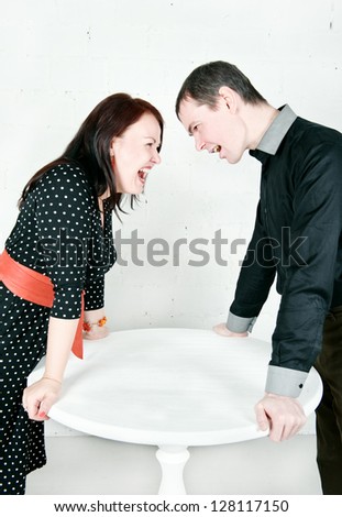 Family conflict: man and woman screaming