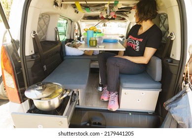 Family Cooking In The Caravan Car