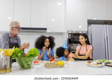 Family Cooking At Home. Happy Family Cooks Together In The Kitchen Home Recreation And Weekend Meal Prep.