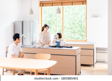 Family Cooking In The Kitchen