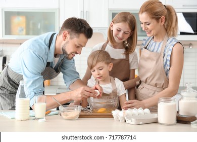 Family cooking in kitchen. Cooking classes concept - Powered by Shutterstock