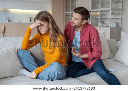 Family couple engages in heated relationship discussion, woman refuses to listen, reflecting tension, communication challenges in partnership. Conflict misunderstand emotional problem, marital discord Stock photo © 