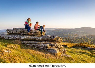 Family In Dartmoor National Park In The Evening, UK