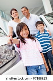 Family At The Dealership Buying A New Car