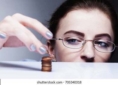 Family Debts. Young Frustrated And Desperate Woman Counting Small Money (Bankrupt, Poverty, Tax, Money Concept)