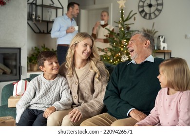 Family of different generation spending time on Christmas time - Shutterstock ID 2209426571
