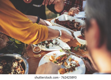 Family Dining Outdoor At Backyard Patio