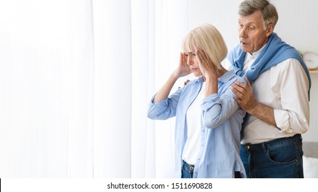 Family Disagreement. Man Consoling Senior Woman After Argument, Offended Wife