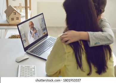 Family Doctor Online. Mom And Child At Home Use A Video Call To Receive Medical Care Online.