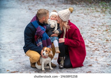 Family With Dog In Winter Park